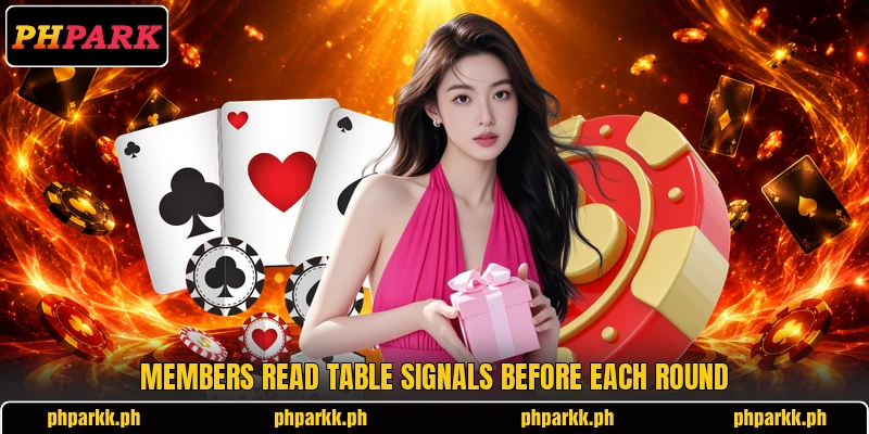 Members read table signals before each round